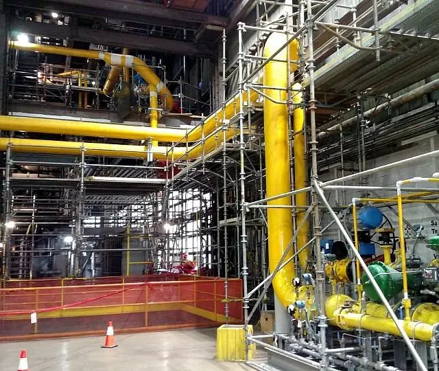 Large yellow pipes, part of the Coal to Natural Gas Fuel Conversion Project in Chicago, IL